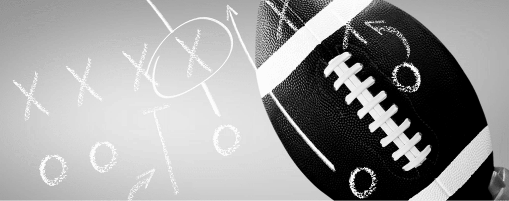 A football with Xs and Os, designed to represent playbook strategy and, more abstractly, the post title "What is Ansible"?